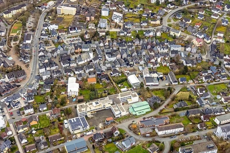 Aerial view, town centre, Städtisches Gymnasium Bad Laasphe, Evang. Church Bad Laasphe, church square, construction site with new building August-Hermann-Francke-Haus, Bad Laasphe, Siegerland, North Rhine-Westphalia, Germany, old town, place of worship, education, educational institution, DE, Europe, half-timbered houses, religious community, place of worship, property tax, grammar school, holy place, church, parish, denomination, educational institute, aerial view, aerial photography, aerial photography, photovoltaic, photovoltaic system, religion, religious site, school, solar, solar system, solar energy, solar energy, overview, bird's-eye view, residential complex, living and life, residential area, residential buildings, birds-eyes view, overview