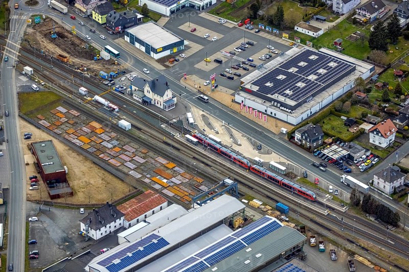Aerial view, Bad Laasphe railway station, Siegerland, North Rhine-Westphalia, Germany, Bad Laasphe, railway tracks, railway station, DE, DTB Dachtechnik Briel, Deutsche Bahn AG, Europe, railway tracks, main railway station, main station, aerial view, aerial photography, aerial photography, metal processing company, Rewe supermarket, Slawinski & Co. GmbH, overview, bird's-eye view, birds-eyes view, overview