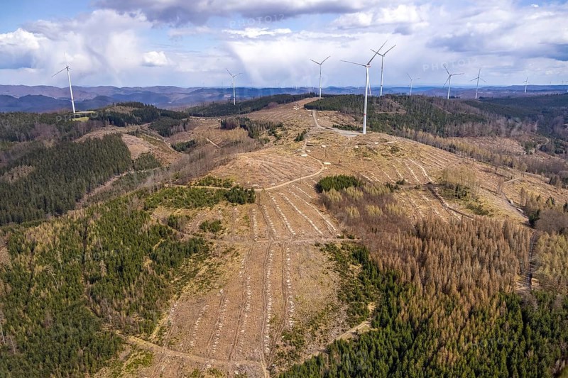 Aerial photo, wind turbines and forest damage in the Banfe forest area, Bad Laasphe, Siegerland, North Rhine-Westphalia, Germany, tree dieback, DE, Europe, aerial photo, aerial photography, aerial photography, overview, bird's-eye view, wind turbines, forest, forest area, forest damage, forest dieback, wind energy, wind turbine, wind power, wind turbine, wind turbines, bird's-eye view, overview, bark beetle plague, spruce dieback, clearing, tree clearing, deforestation, wood pile