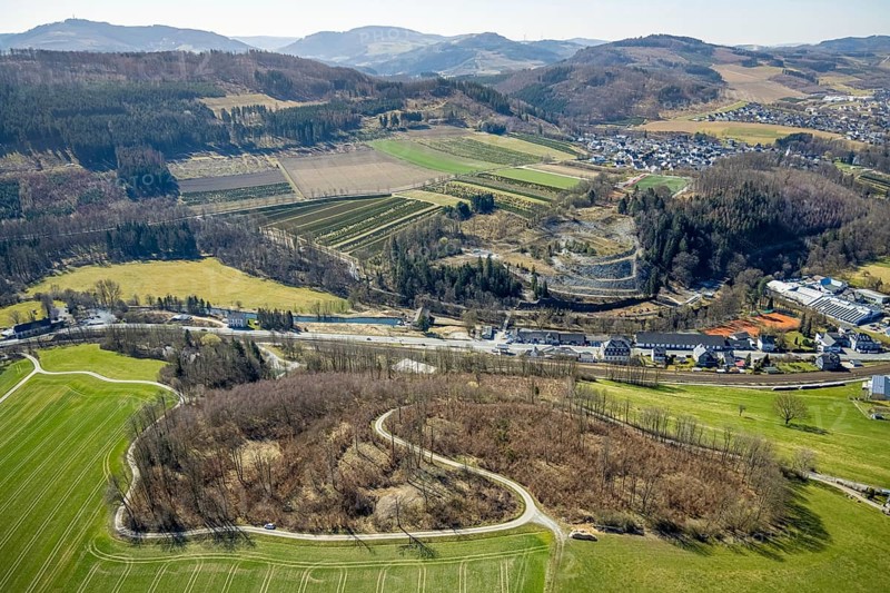 Aerial view, slate mine Nuttlar, visitor mine slate mine Nuttlar, slag heap former Ostwig mine, Nuttlar, Bestwig, Sauerland, North Rhine-Westphalia, Germany, federal road B7, DE, Europe, distant view, slag heap, hilly landscape, aerial view, aerial photography, aerial photography, overview, bird's eye view, forest area, meadows and fields, birds-eyes view, historic slate mine, overview