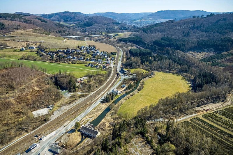 Aerial view, federal road B7, river Ruhr, hydroelectric power station Nuttlar, district Dümel, Ruhr valley bridge Bermecke, Nuttlar, Bestwig, Sauerland, North Rhine-Westphalia, Germany, motorway bridge, railway tracks, bridge, federal road B480n, DE, Europe, hilly landscape, aerial view, aerial photography, aerial photography, overview, bird's-eye view, forest area, birds-eyes view, overview