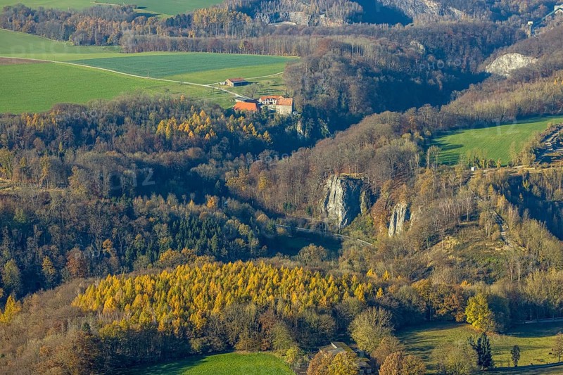 Aerial view, Reckenhöhle dripstone cave in the autumnal forest in the district Volkringhausen in Balve, Sauerland, North Rhine-Westphalia, Germany, Balve, DE, Europe, Hönnetal, aerial view, aerial photography, aerial photography, sight, dripstone cave, overview, bird's eye view, birds-eyes view, overview