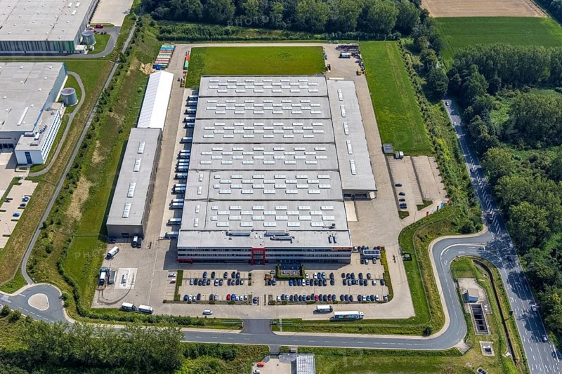 Aerial view, commercial area Lünener Straße at the motorway A2, Heldt Gebäudetechnik and DHL Ernst-von-Bodelschwingh-Street in Weddinghofen, Bergkamen, Ruhr area, North Rhine-Westphalia, Germany, DE, DHL Logistik, Europe, commercial enterprises, commercial area, commercial park, commercial location, commercial use, industrial area, industrial building, industrial location, aerial photograph, aerial photography, aerial photography, overview, bird's-eye view, birds-eyes view, overview