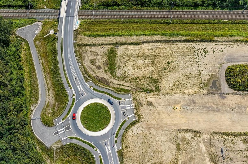 Aerial view, construction site and new roundabout at the Wasserstadt Aden in Oberaden, Bergkamen, Ruhr area, North Rhine-Westphalia, Germany, construction work, construction area, construction site, construction project, construction site, DE, Europe, shapes and colours, roundabout, roundabout, aerial photograph, aerial photography, aerial photography, new construction, overview, bird's-eye view, overview