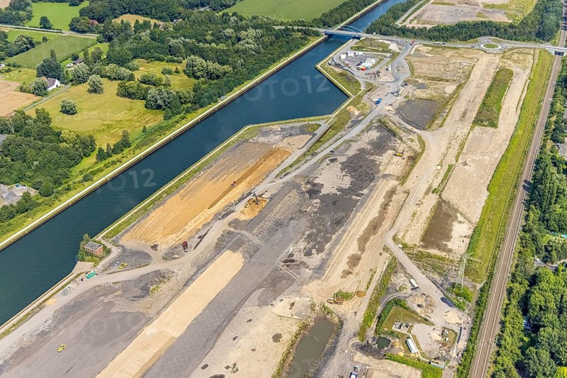 Aerial view, construction site for planned urban quarter Wasserstadt Aden on the site of the former Haus Aden colliery on the Datteln-Hamm Canal in Oberaden, Bergkamen, Ruhr area, North Rhine-Westphalia, Germany, construction work, construction area, building site, building plots, construction project, construction site, DE, Europe, canal, aerial view, aerial photography, aerial photography, new building, overview, bird's eye view, living and living, residential neighbourhood, birds-eyes view, overview