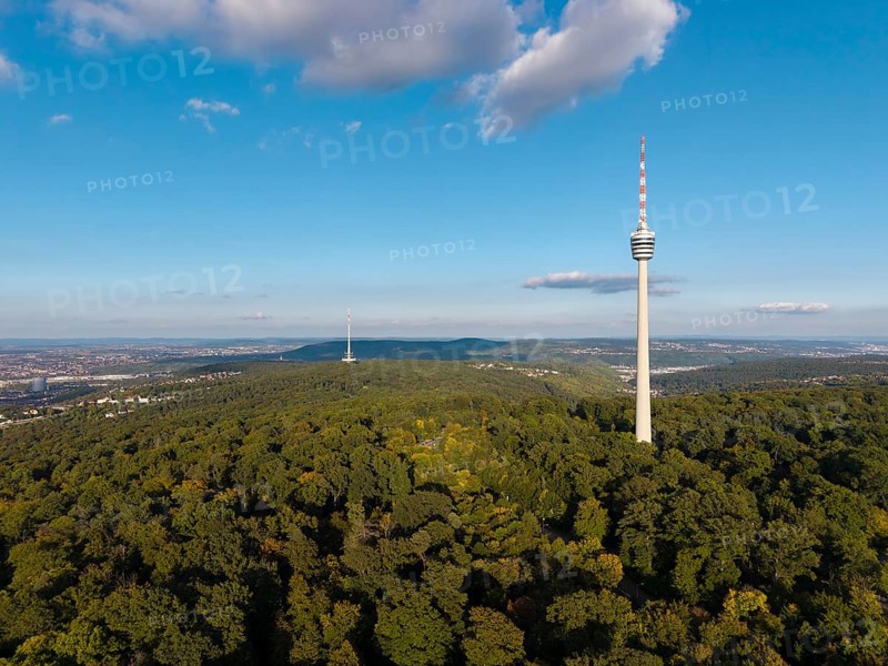 The television tower above a wooded area shows a clear sky and scattered clouds, Stuttgart-Degerloch, Baden-Württemberg, Germany