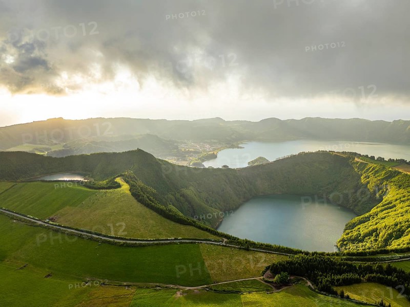 Sete Cidades Caldera at Sunset. Blue Lake and Santiago Lake. Azores, Sao Miguel Island. Portugal. Clouds and Fog. Aerial View