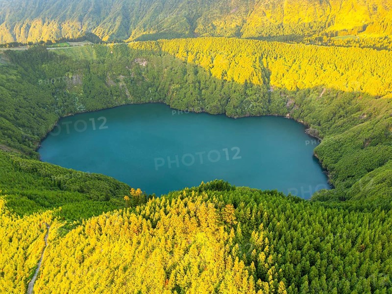 Lake Santiago. Sete Cidades Caldera at Sunset. Lush Green Hills with Forest. Azores, Sao Miguel Island. Portugal. Aerial View