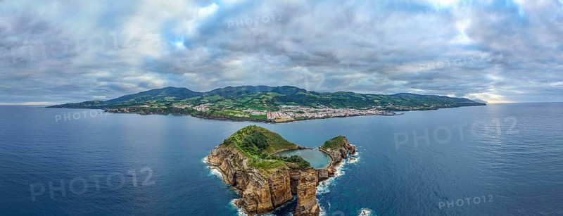 Horizontal Panorama of Vila Franca Islet, Vila Franca Do Campo Town, Dramatic Sky and Atlantic Ocean. Azores, Sao Miguel Island. Portugal. Aerial Drone Shot