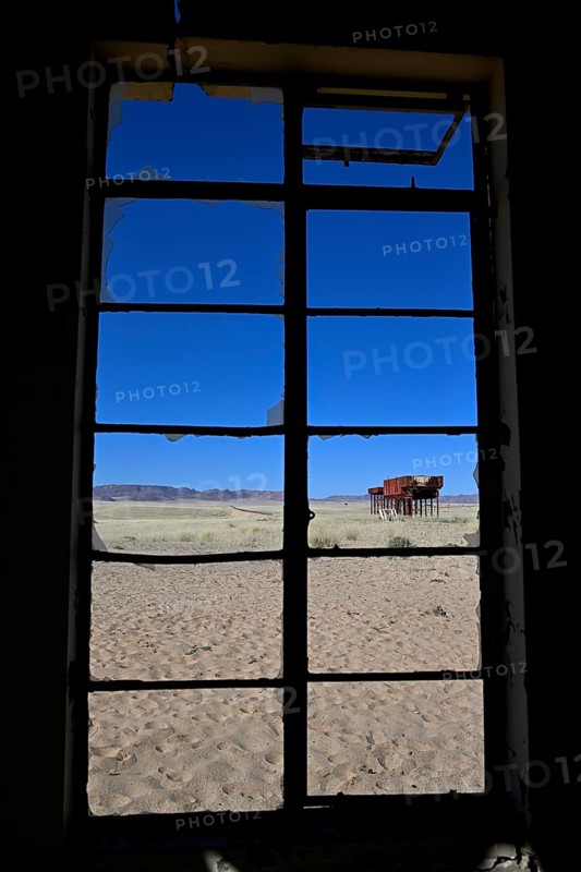 View from the window of the old German railway station of Garub into the Namib Desert, near Aus, Karas Region, Namibia