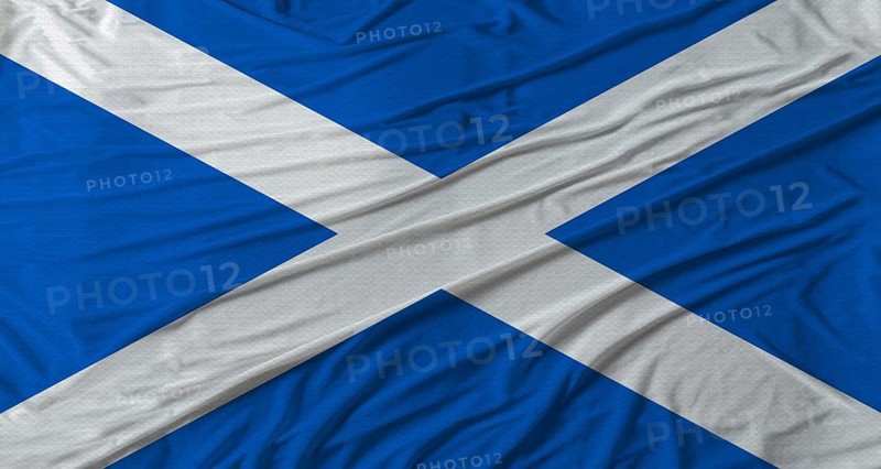 Scottish flag waving. Flag of Scotland with cloth texture