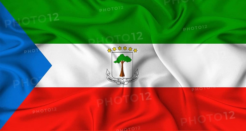 Realistic Equatorial Guinea flag waving. Close up of flag of Equatorial Guinea with cloth texture