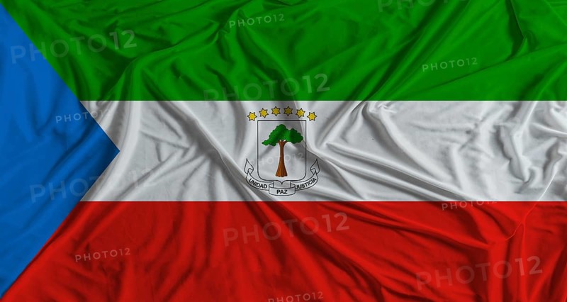 Equatoguinean flag with fabric texture background. National flag of Equatorial Guinea