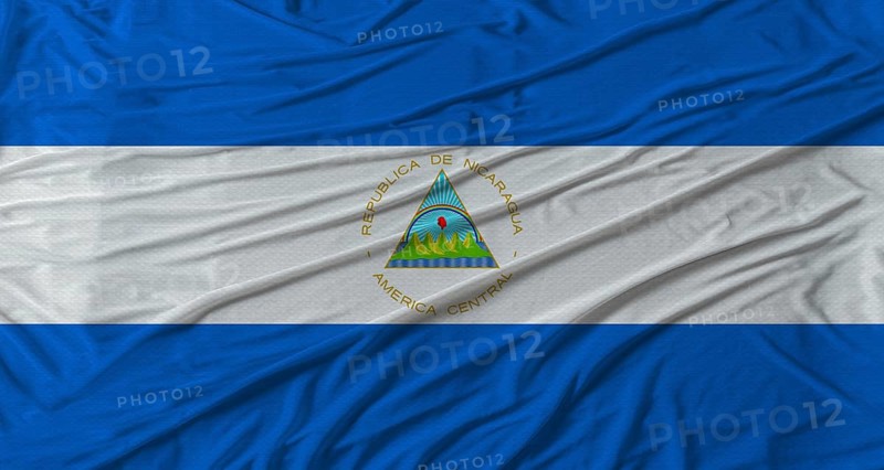 Nicaraguan flag waving. Flag of Nicaragua with cloth texture