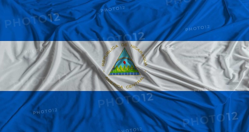 Nicaraguan flag with fabric texture background. National flag of Nicaragua