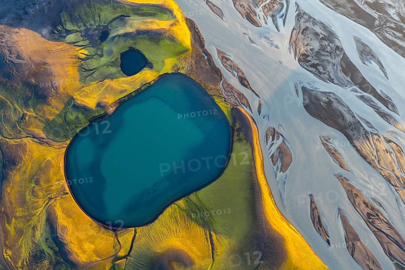 Turquoise crater lake and glacial river, Icelandic Highlands, Iceland