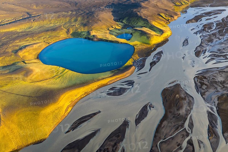 Turquoise crater lake and glacial river, Icelandic Highlands, Iceland