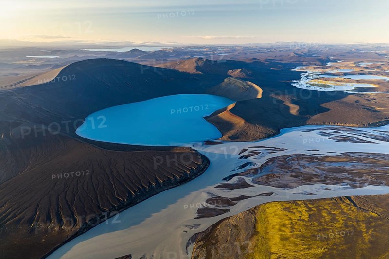 Turquoise crater lake Skyggnisvatn and glacial river, Icelandic Highlands, Iceland