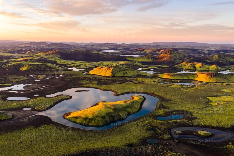 Mossy landscape and lakes at sunrise, Icelandic Highlands, Iceland