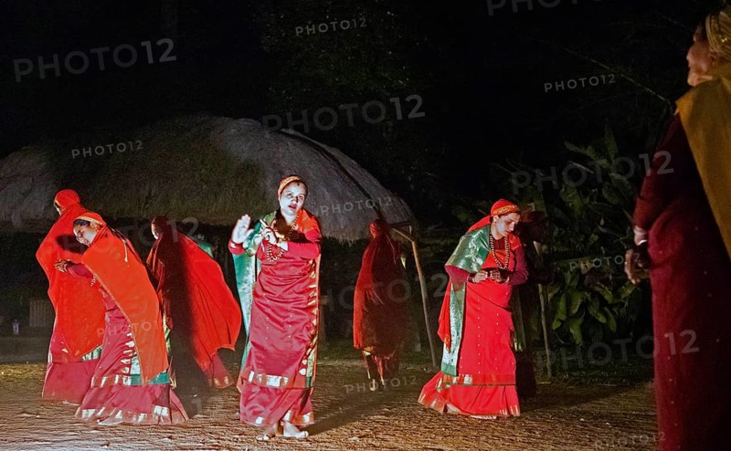 Kodava woman in traditional dress dancing in the evening, Coorg, Karnataka, India