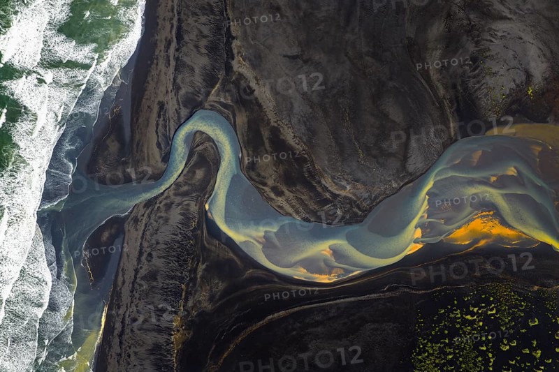 Interwoven river with colourful sediments, South Iceland, Iceland