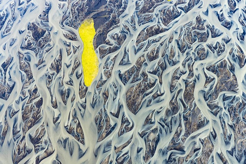 Small island in the branched course of a glacial river, South Iceland, Iceland