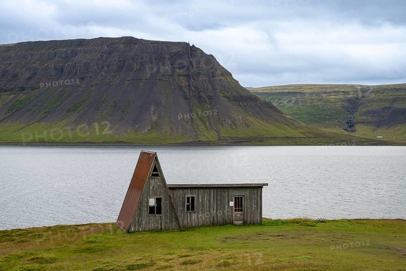Old abandoned house by the fjord, Westfjords, West Iceland, Iceland