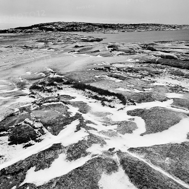 Rocky landscape in Ramvikslandet nature reserve, black and white, analogue, Bohuslän, Västra Götaland, Sweden