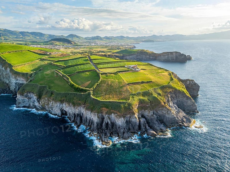 Cape Cintrao, Cliffs, Green Hills, Fields and Atlantic Ocean. Azores, Sao Miguel Island. Portugal. Aerial View