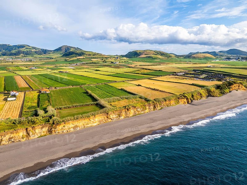 Areal de Santa Barbara Beach, Green Lush Fields and Atlantic Ocean. Azores, Sao Miguel Island. Portugal. Aerial View