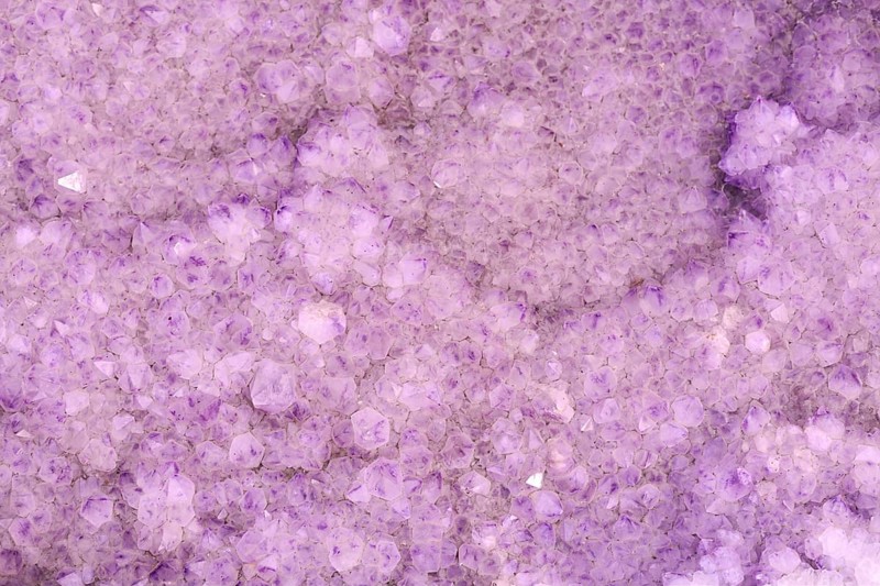 Close up of violet Amethyst Cactus Quarz stone