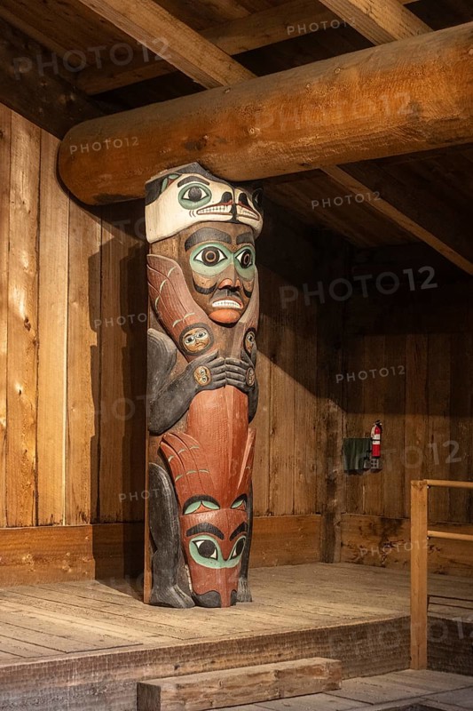 Totem poles in a Tlingit Clan House, Totem Bight State Historical Park, Ketchikan, Alaska, USA