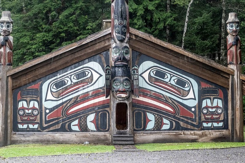 Totem poles at a Tlingit Clan House, Totem Bight State Historical Park, Ketchikan, Alaska, USA