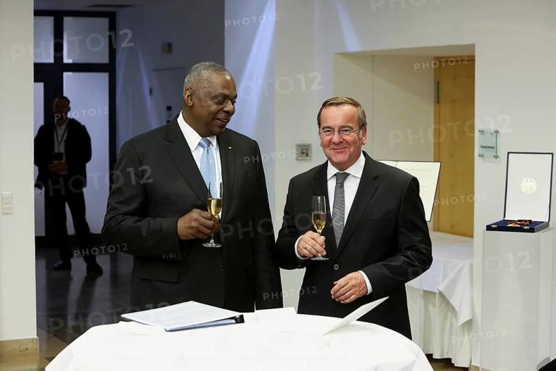 Federal Minister of Defence Boris Pistorius with Lloyd James Austin III former United States Secretary of Defence 2021 to 2025 at the champagne reception - Award of the Order of Merit of the Federal Republic of Germany to Lloyd James Austin III in recognition of his personal commitment to strengthening German-American friendship and bilateral defence and military policy cooperation at the Federal Ministry of Defence, Berlin, 01.10.25
