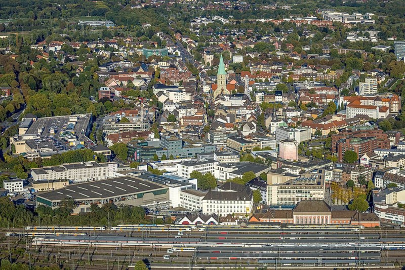 Aerial view, city centre view with evang. St. Paul's Church, city festival with Ferris wheel, platforms of the main station, centre, Hamm, Ruhr area, North Rhine-Westphalia, Germany, place of worship, railway area, station, platform, DE, Deutsche Bahn AG, Europe, religious community, railway tracks, tracks, house of God, main station, main station, holy place, church, church community, denomination, aerial view, aerial photography, aerial photography, religion, religious site, overview, bird's eye view, birds-eyes view, overview