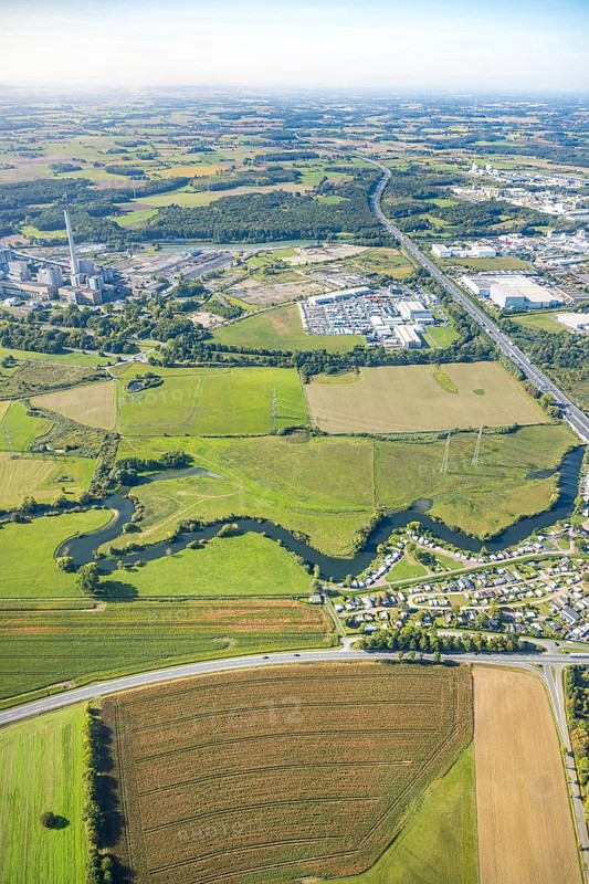 Aerial view, river Lippe river meander floodplain landscape Schmehauser Mersch, meadows and fields, Funke Kunststoffe GmbH at the A2 motorway and RWE power plant Westfalen, deconstruction at the port construction area Geithe, planned A2 motorway junction Siegenbeckstraße, Uentrop, Hamm, Ruhr area, North Rhine-Westphalia, Germany, agriculture, DE, Europe, commercial enterprise, commercial area, commercial area, commercial property, commercial site, commercial use, industrial area, industrial site, agricultural fields, aerial view, aerial photography, aerial photography, overview, bird's-eye view, meadows, birds-eyes view, overview