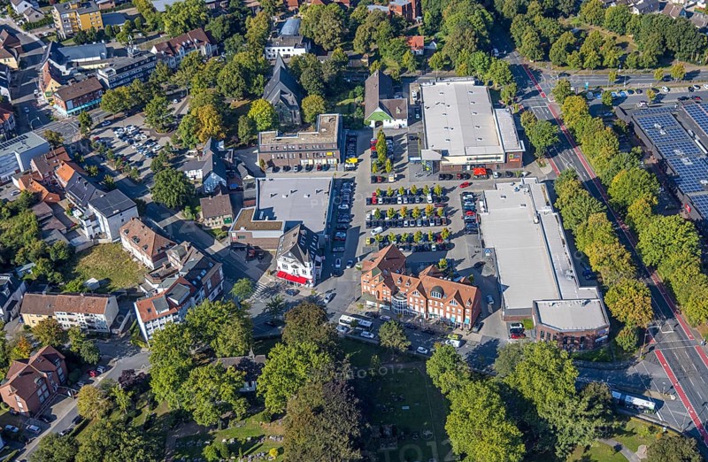 Aerial view, shopping centre Herringen with supermarket DM, Edeka Weber and Aldi, evang. Sankt-Viktor-Kirche, district Herringen, Hamm, Ruhr area, North Rhine-Westphalia, Germany, DE, shopping, shopping centre, shopping place, shopping mall, Europe, aerial view, aerial photography, aerial photography, local supply centre, shopping centre, supermarket, overview, bird's eye view, birds-eyes view, overview