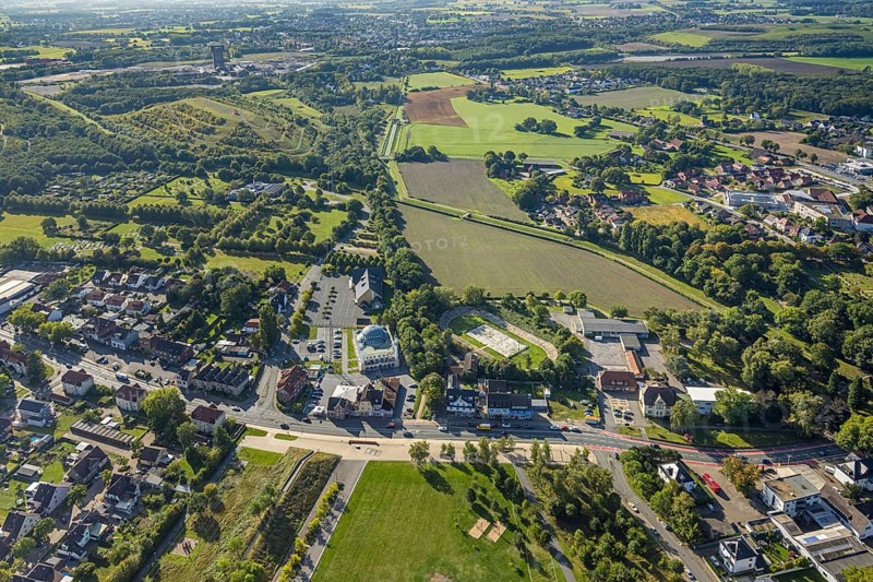 Aerial view, DitiB Ulu Camii Mosque next to the Barbara Stadium, Herringer Bach, behind the CreativRevier with Hammerkopfturm and slag heap Humbert, district Herringen, Hamm, Ruhr area, North Rhine-Westphalia, Germany, place of worship, slag heap, CreativRevier Heinrich Robert, DE, Europe, religious community, place of worship, slag heap, sacred site, church, parish, denomination, aerial view, aerial photography, aerial photography, religion, religious site, sports facility, sports field, stadium, overview, bird's-eye view, overview