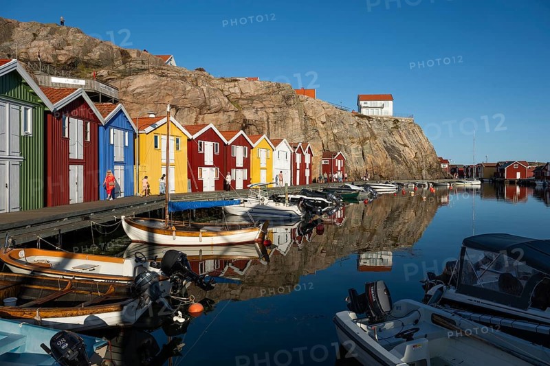 Boats and colourful boathouses in the harbour of Smögen, Smögenbryggan, Västra Götalands Län, Bohuslän, Sweden