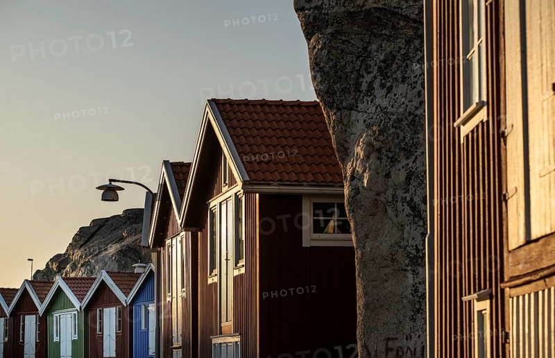 Boathouses between rocks in the harbour of Smögen, Smögenbryggan, Västra Götalands Län, Bohuslän, Sweden