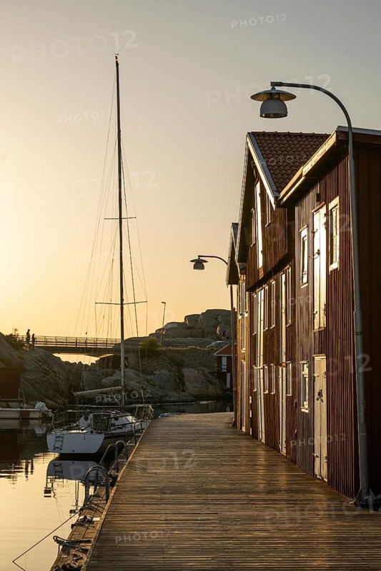 Boats and boathouses in the harbour of Smögen, Smögenbryggan, Västra Götalands Län, Bohuslän, Sweden