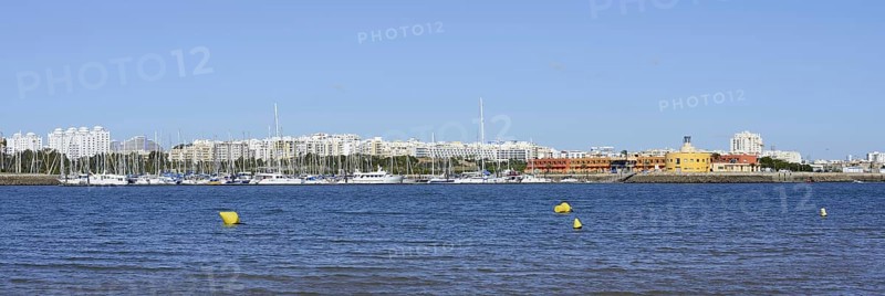 View from Ferragudo to Portimao with marina, Algarve, Portugal