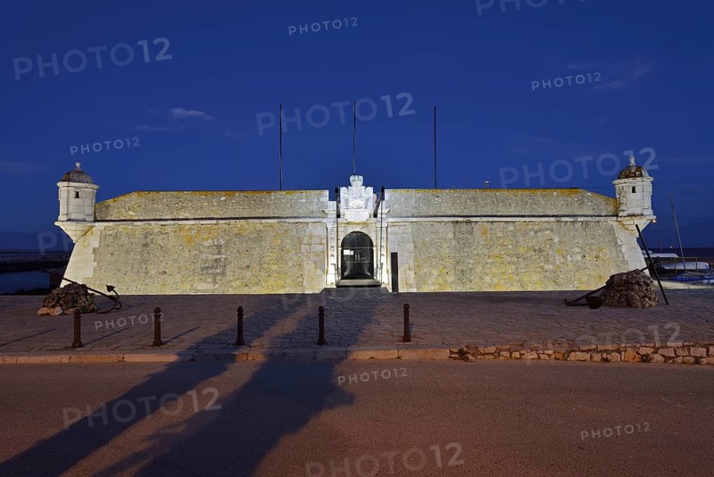 Forte da Ponta da Bandeira fortress by night, Lagos, Algarve, Portugal