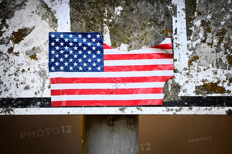 Torn sticker from US flag
