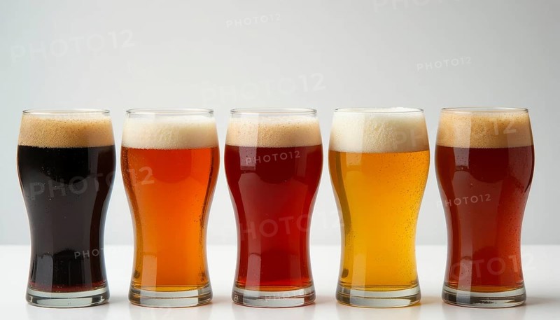 A selection of beers in different colors and styles, showcasing the diversity of craft brewing with foamy heads, AI generated