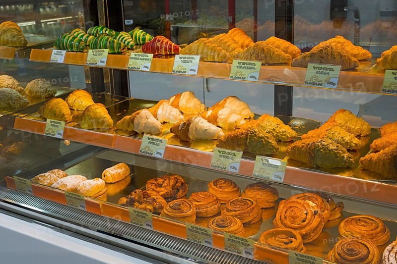Different types of pastries displayed in a sales counter, Gntunik supermarket, Aragazotn province, Armenia
