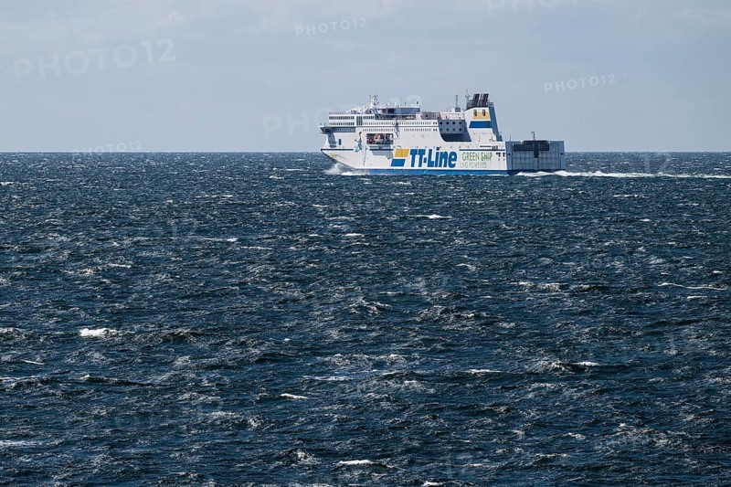 LNG-powered TT-Line ferry travelling across a gently moving blue sea, near Warnemünde, Rostock, Mecklenburg-Vorpommern, Germany