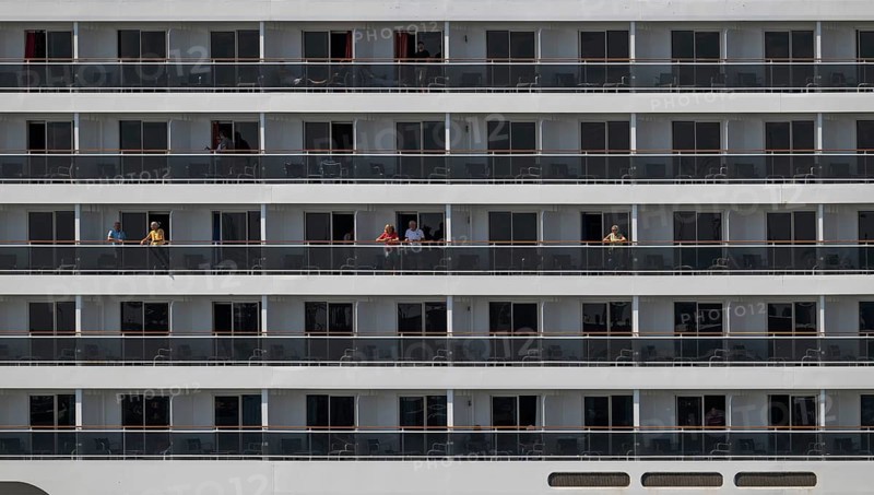 Detailed view of balconies of a cruise ship with passengers, Warnemünde, Rostock, Mecklenburg-Vorpommern, Germany