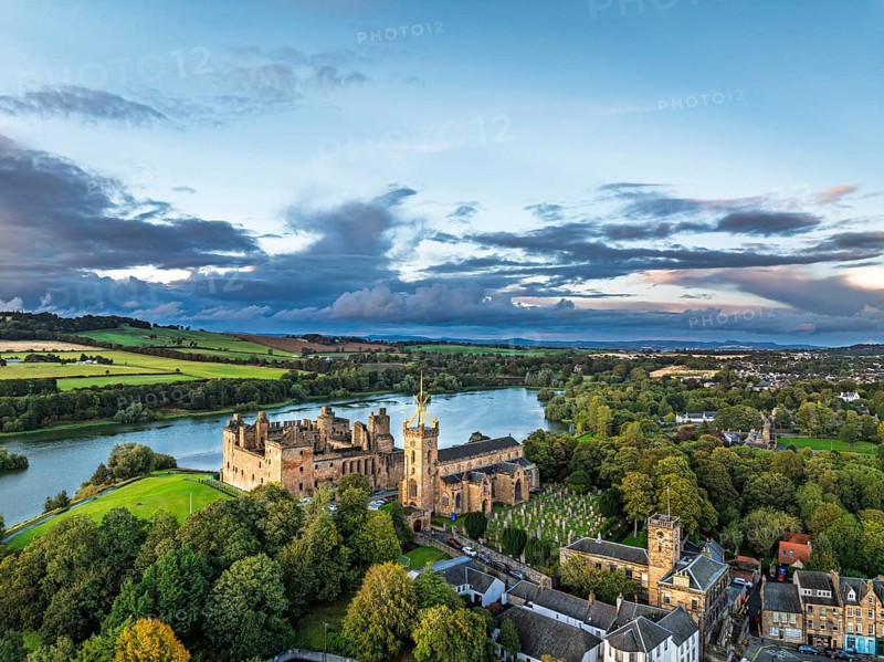 Sunset over Linlithgow Palace from a drone, Linlithgow Loch, West Lothian, Scotland, United Kingdom
