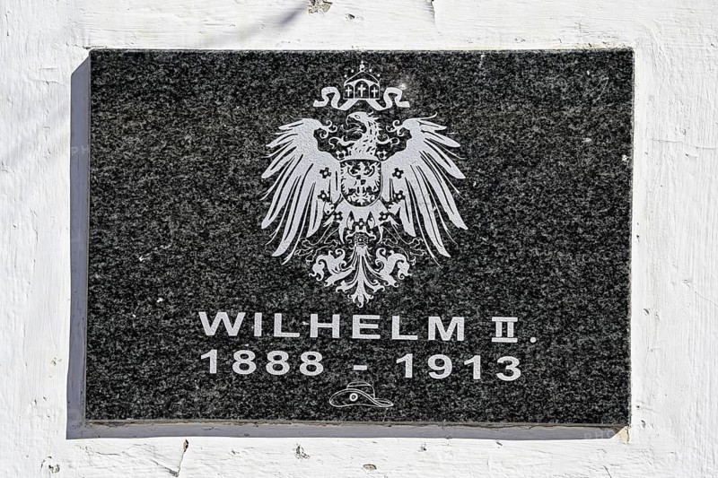Memorial plaque on the monument to Kaiser Wilhelm II at the railway station in Aus, Karas Region, Namibia